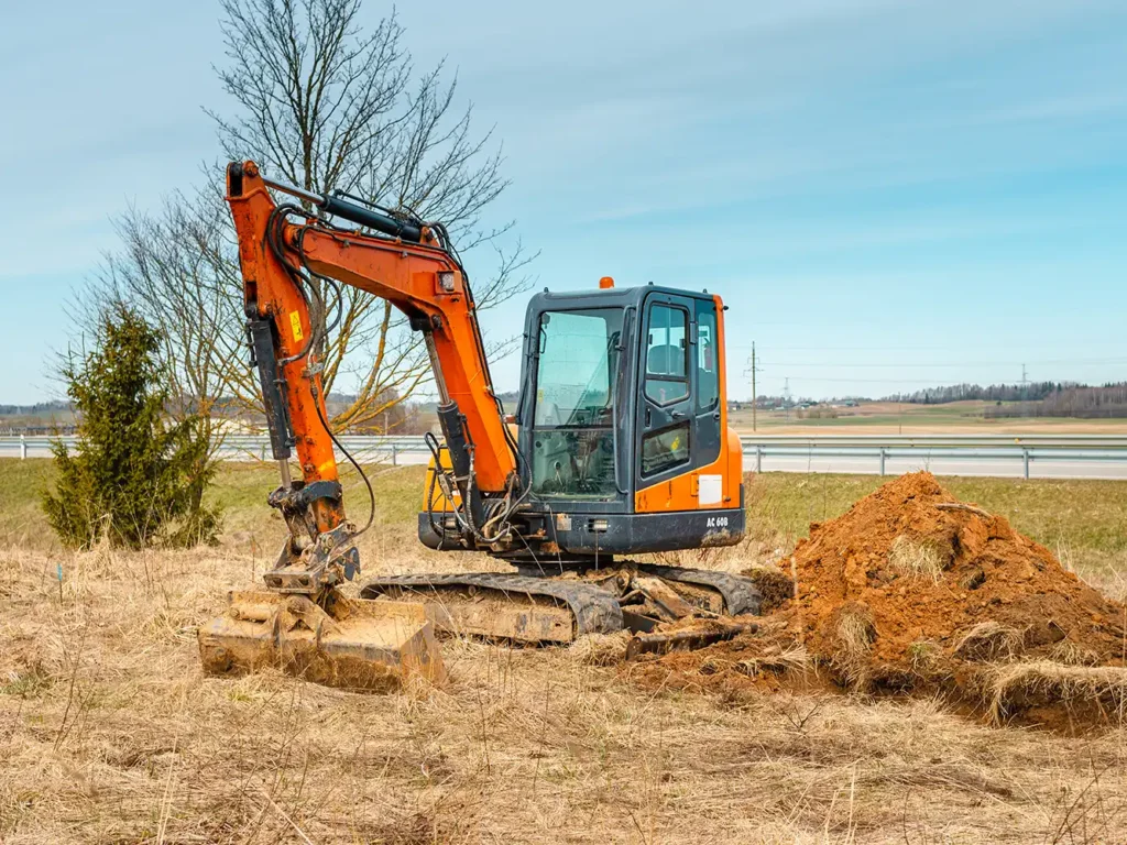 Výměna gumového pásu u minirypadla